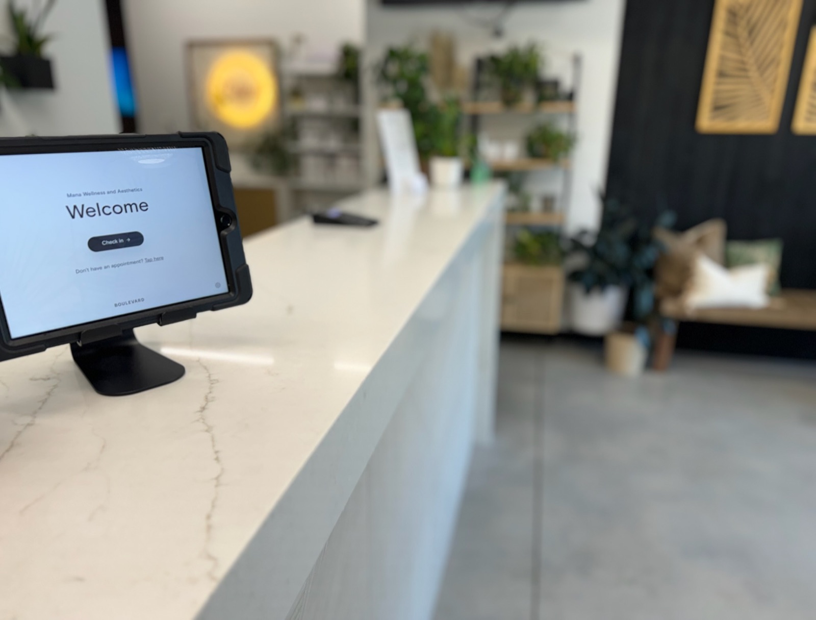 The Mana Wellness welcome screen at check-in